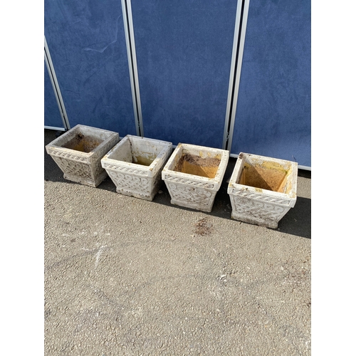 391 - A set of Four stone Cotswold studio planters