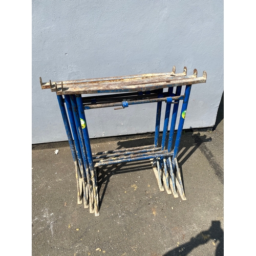 400 - Four adjustable steel trestles/bandstands