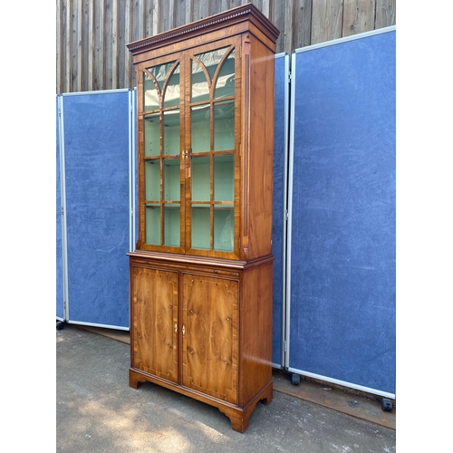 409 - Vintage Yew wood glazed bookshelf /display cabinet