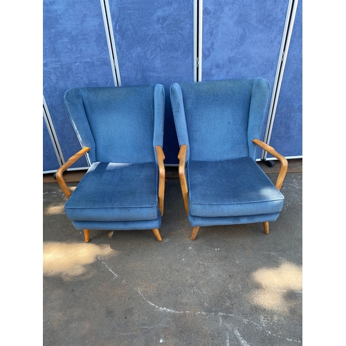 423 - A pair of Bambino Armchairs by Howard Keith c 1950's in blue fabric upholstery