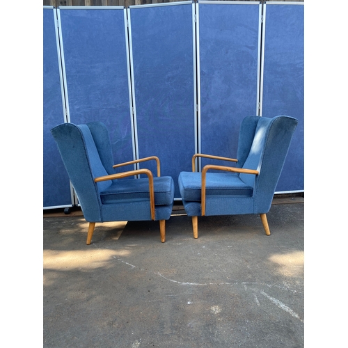 423 - A pair of Bambino Armchairs by Howard Keith c 1950's in blue fabric upholstery