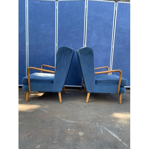 423 - A pair of Bambino Armchairs by Howard Keith c 1950's in blue fabric upholstery