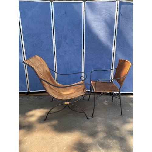 452 - Two interesting Mid century chairs 

Leather and wrought iron lounging armchair (Left)
Wrought Iron ... 