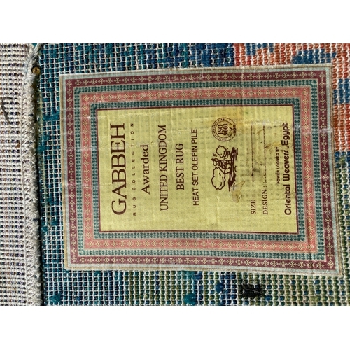 477 - A large Gabbeh rug Heat Set Olefine Pile

Dimensions - 112