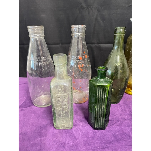 171 - Quantity of vintage / antique branded glass bottles inc Schweppes ,  + 1 clay WD Rawlings bottle