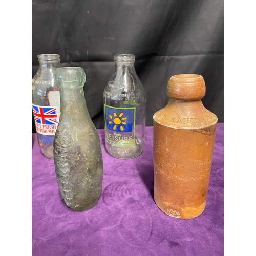 171 - Quantity of vintage / antique branded glass bottles inc Schweppes ,  + 1 clay WD Rawlings bottle