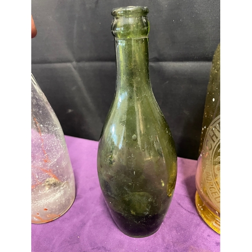 171 - Quantity of vintage / antique branded glass bottles inc Schweppes ,  + 1 clay WD Rawlings bottle