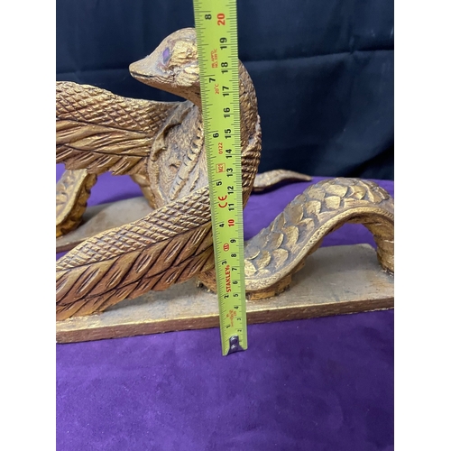 184 - A pair of gilded winged serpent mythical interior design ornaments - carved wood 61cm x 20cm each