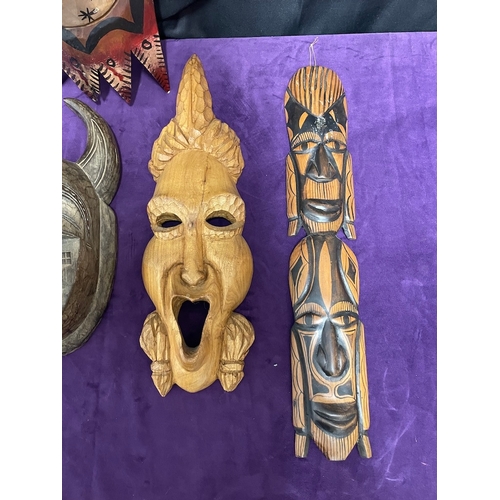 52 - Collection of tribal masks / wall hangings