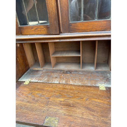 185 - Edwardian Oak glazed front display cabinet  over Bureau 

Dimensions - 30