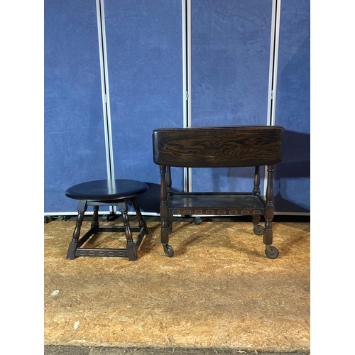 195 - A lot of two mahogany pieces. Small side table and drop leaf trolley table on wheels.

Please see im... 