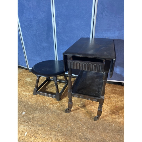 195 - A lot of two mahogany pieces. Small side table and drop leaf trolley table on wheels.

Please see im... 