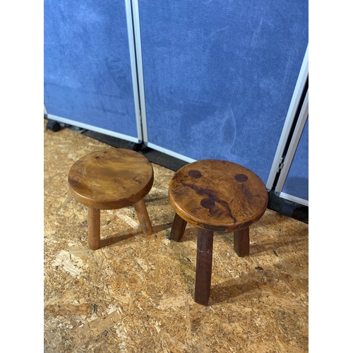 200 - Two vintage milking stools 
Heights approx 12.5