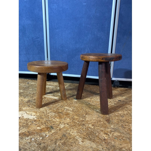 200 - Two vintage milking stools 
Heights approx 12.5