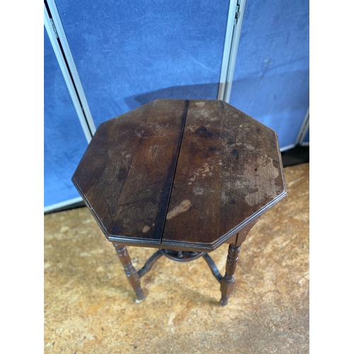 215 - Vintage octagonal occasional/side table on wheels. 

Dimensions - 24