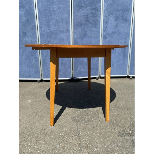 259 - Lovely teak drop leaf table. 

See images for dimensions.