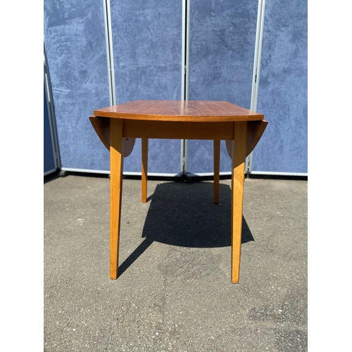 259 - Lovely teak drop leaf table. 

See images for dimensions.