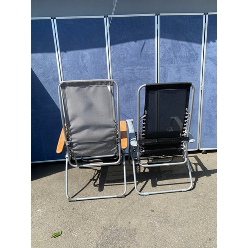 279 - A pair of recliner foldable sun loungers. One made by lafuma