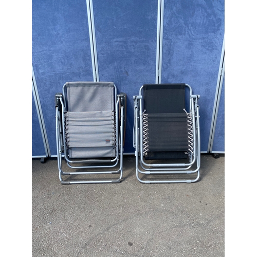 279 - A pair of recliner foldable sun loungers. One made by lafuma