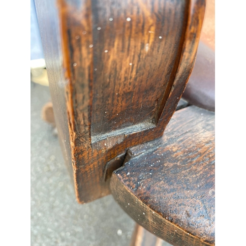 284 - Antique oak and leather swivel desk office chair.