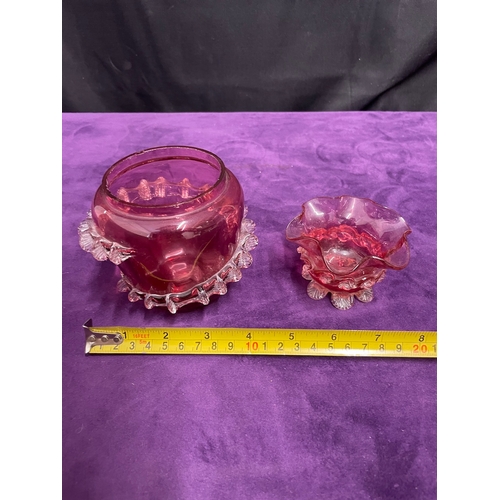 39 - Two antique hand blown cranberry glass vases