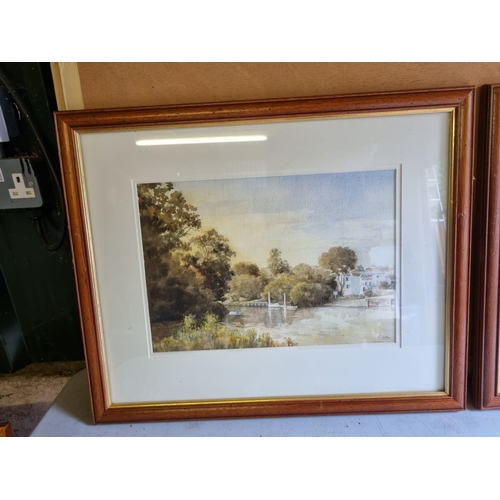 331 - A pair of signed watercolours by R Arthur.