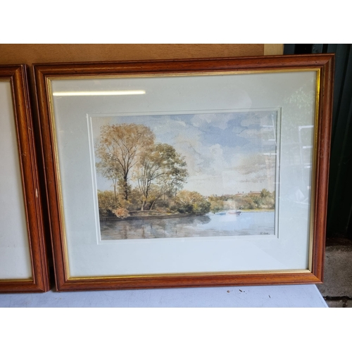 331 - A pair of signed watercolours by R Arthur.