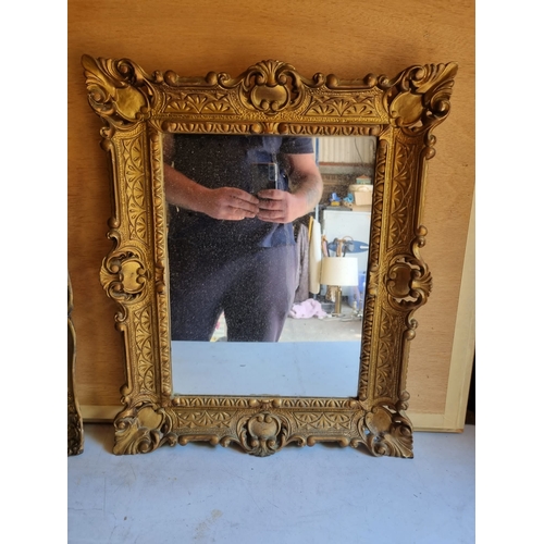 380 - A pair of vintage gilt framed mirrors.