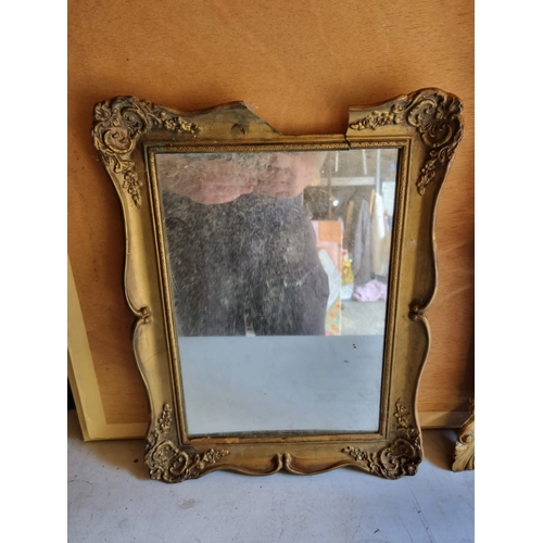 380 - A pair of vintage gilt framed mirrors.