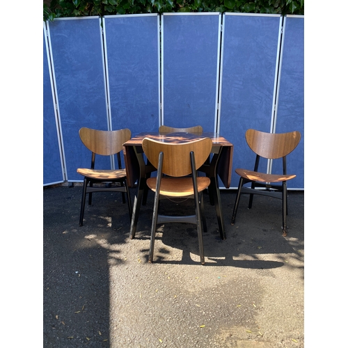 393 - A lovely mid century G-Plan table and four chairs.

See images for dimensions of table.