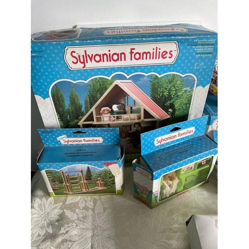 63 - Quantity of 1980's Boxed Sylvanian Families Figures and Buildings / Accessories