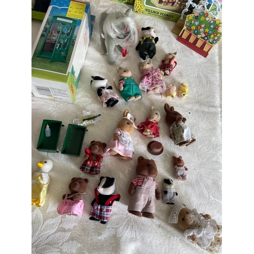 63 - Quantity of 1980's Boxed Sylvanian Families Figures and Buildings / Accessories