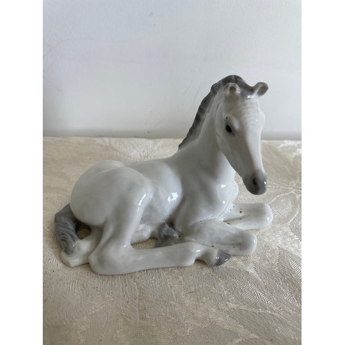 68 - Pair of USSR Porcelain Horses Laying