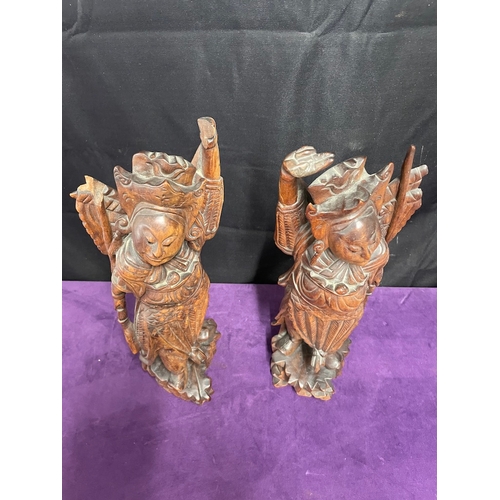 82 - Two Asian Craved wood statues - 40cm