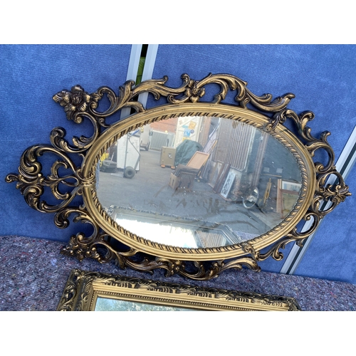 438 - A couple of golden plastic framed mirrors. 

See images for dimensions.