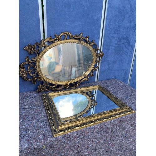 438 - A couple of golden plastic framed mirrors. 

See images for dimensions.