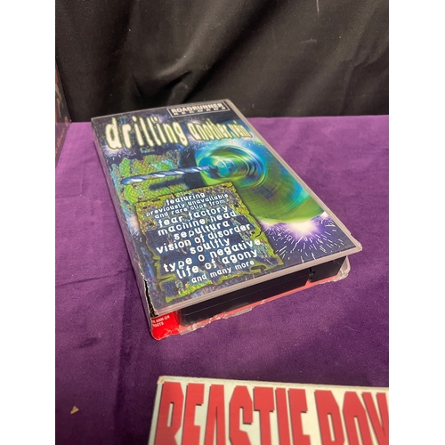 104 - Collection of Music VHS in Queen, Korn, Beastie Boys, Fishbone, 1996 Eye Candy DJ , Drilling Another... 