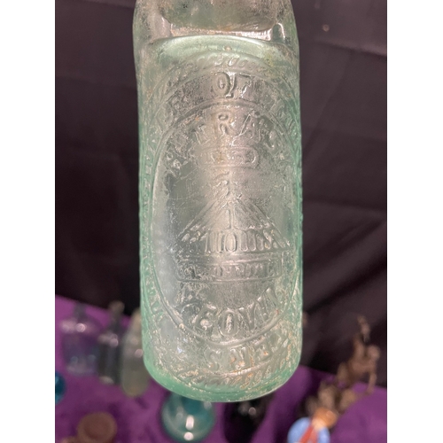 129 - Quantity of collectables mainly consisting of Vintage branded glass bottles