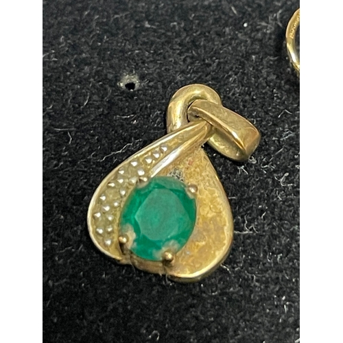 67A - 9CT Yellow gold pendant with emerald stone insert
14ct yellow gold and diamond earrings