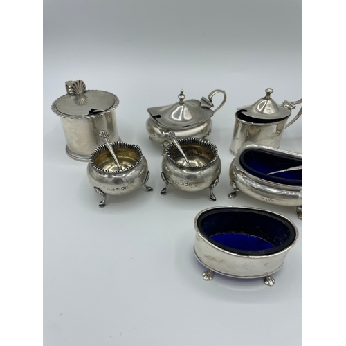 29 - Quantity of Sterling Silver Mustard / Condiment  Pots with Bristol Blue Liners - 477g (Silver only w... 