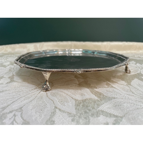 37 - A lovely Edwardian Sterling Silver Salver Raised on Claw & Ball Feet , Monogrammed to the centre. Sh... 