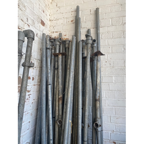 283 - A collection of scaffolding with two bolt lock doors