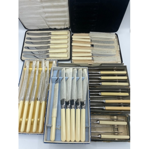 61 - Quantity of cased vintage cutlery