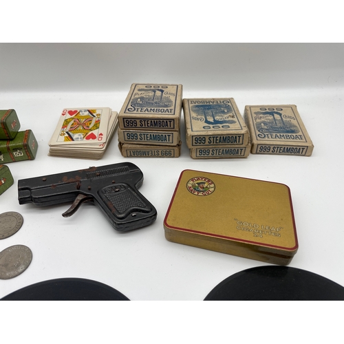 118 - Quantity of vintage collectables inc Rowntree Tin's , 999 Steamboat Playing cards , Toy gun, records... 