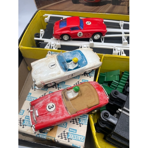 81 - Vintage Boxed Scaletrix Set plus additional Cars / Stand / Power unit