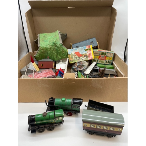 88 - Collection of vintage train set scenery / buildings plus tin plate Hornby engines / carriages