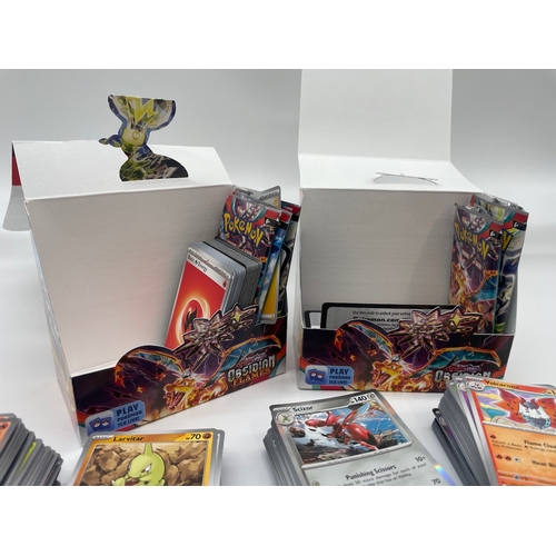 86 - Two booster boxes of Pokemon Obsidian Flames Trading Cards including common, uncommon, rare , holos ... 