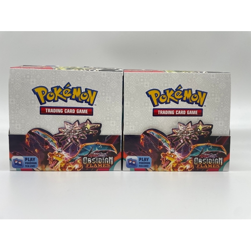 86 - Two booster boxes of Pokemon Obsidian Flames Trading Cards including common, uncommon, rare , holos ... 