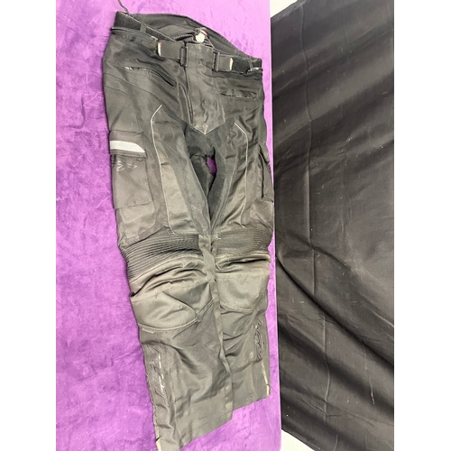 105 - Two pairs of Mens Motorbike Trousers XL / 36