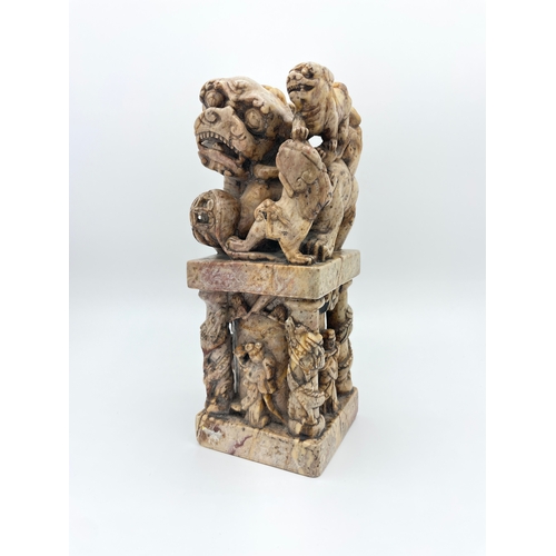 63 - Large 20th Century Chinese Carved Soapstone Seal, depicting family of Foo Dogs above oriental figure... 